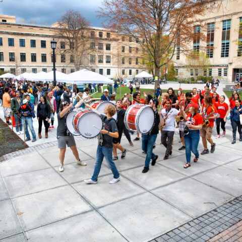 The Cornell marching band performs near Mann Library for CALS Day.