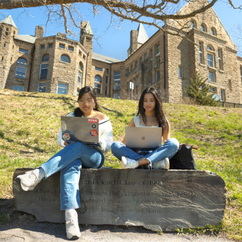 Students study on the Slope on a warm spring day