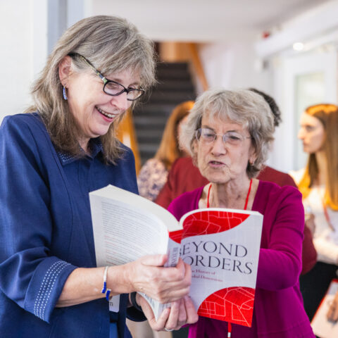 Two retired faculty exploring the CAPE book 